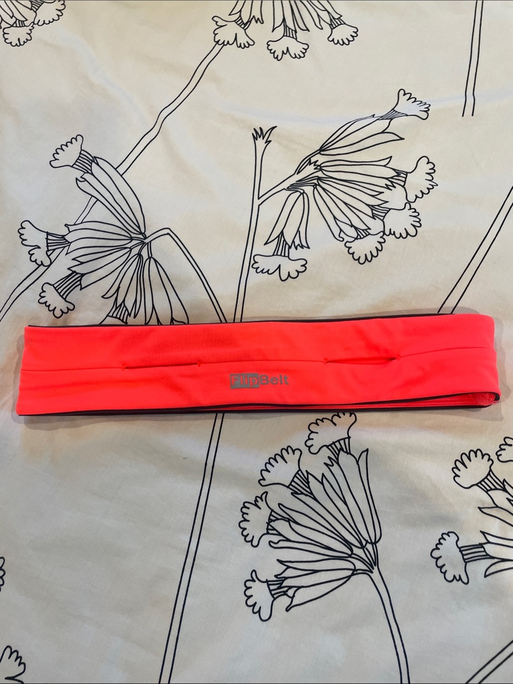 FlipBelt Neon Coral Running Headband